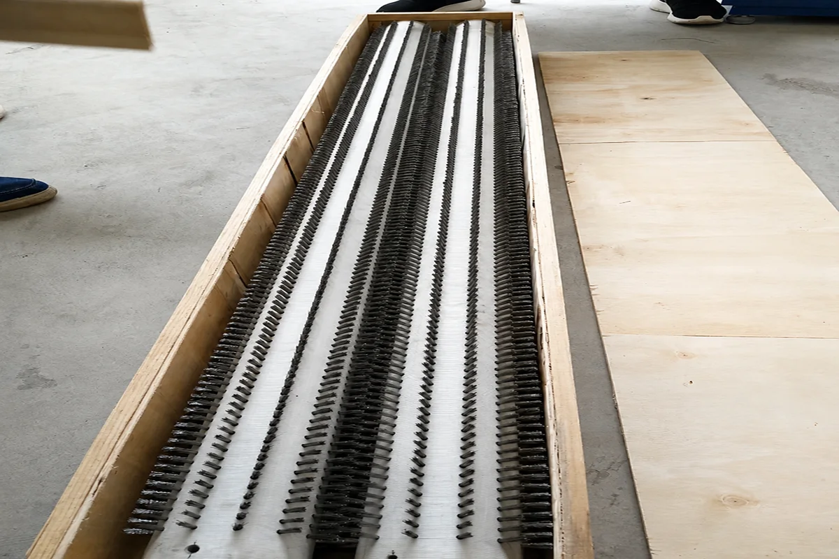 Large custom industrial roller brush protected in a wooden shipping case