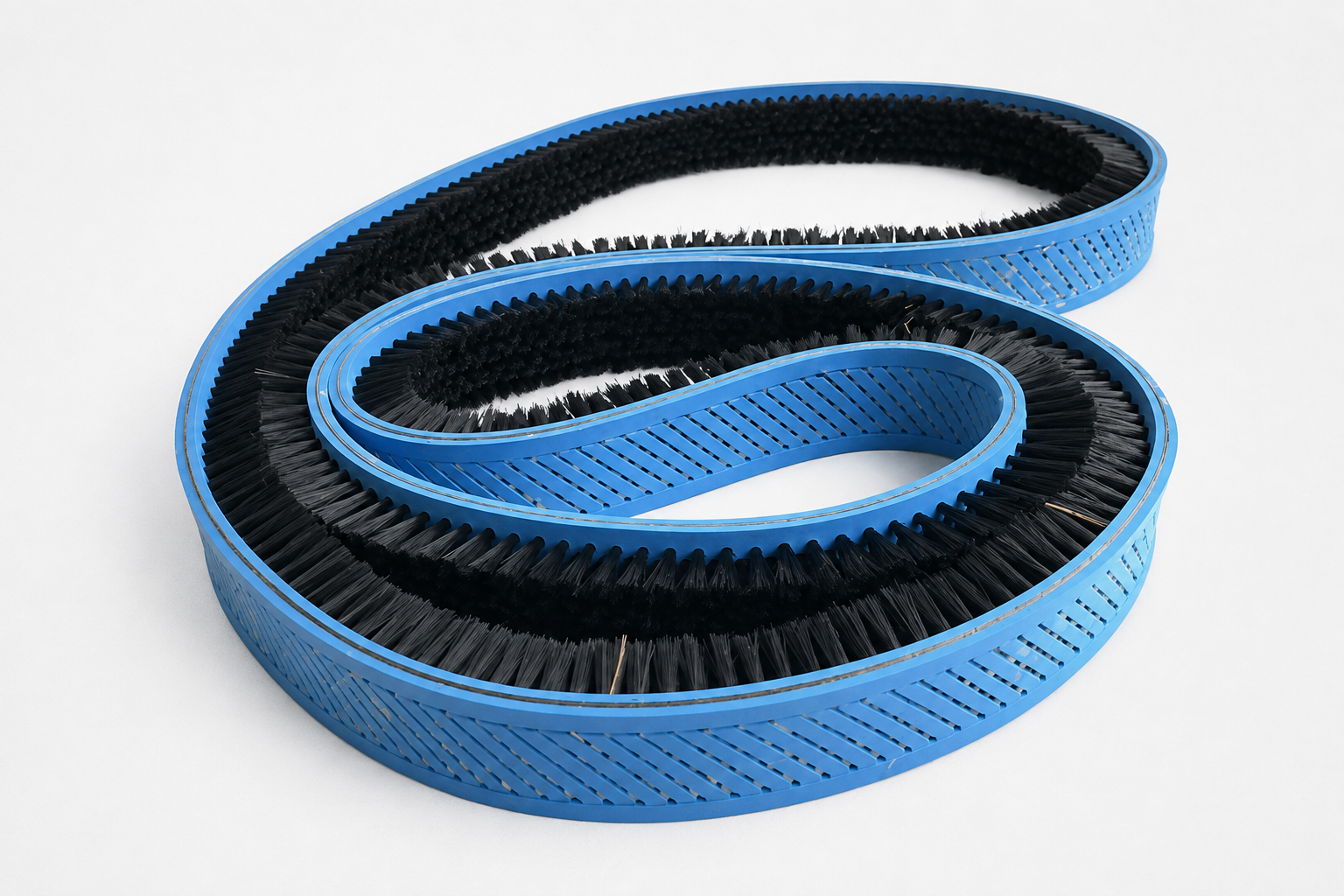 Flat belt brush for cleaning and machine contact