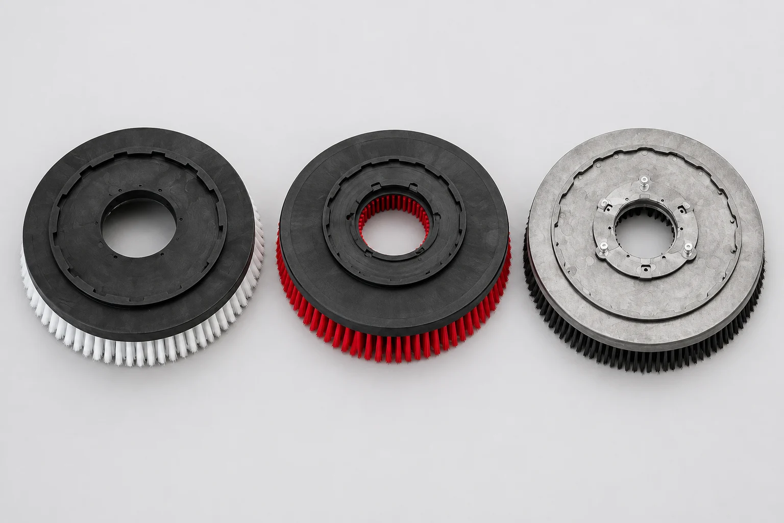 Disc brush with a machine-specific clutch plate, gimbal, and mounting lugs