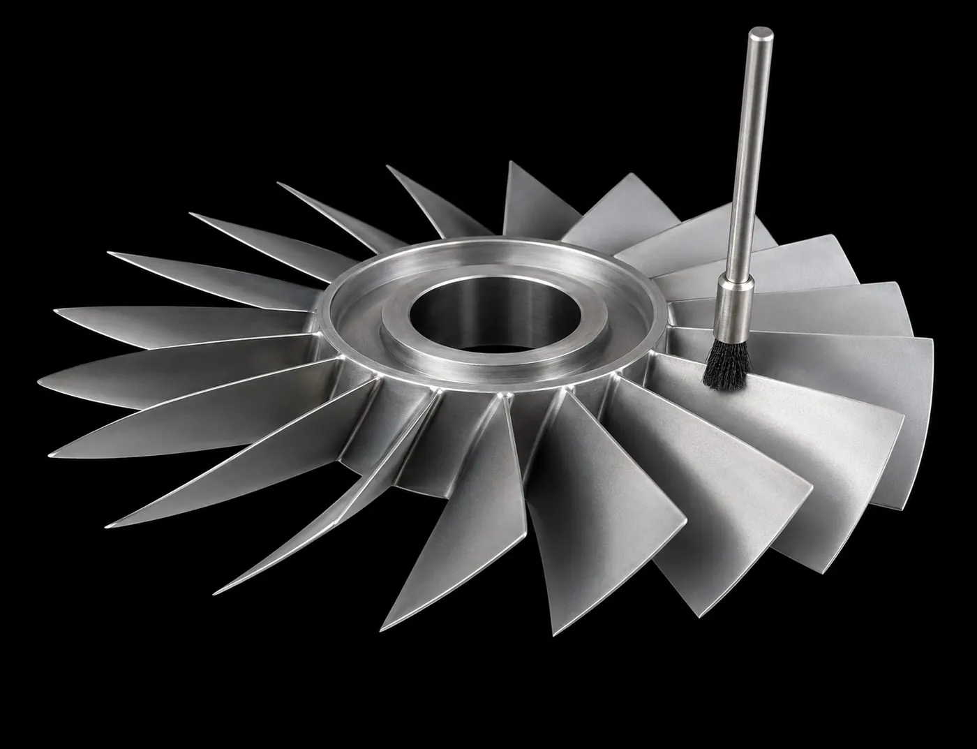Aerospace blisk edge deburring brush application on machined metal component