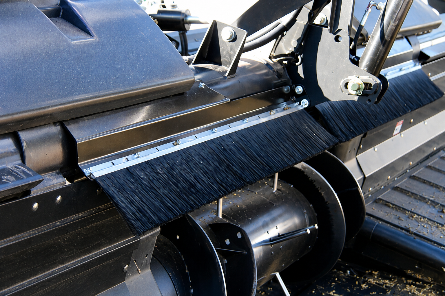 Agricultural strip brush sealing a machinery opening against crop debris