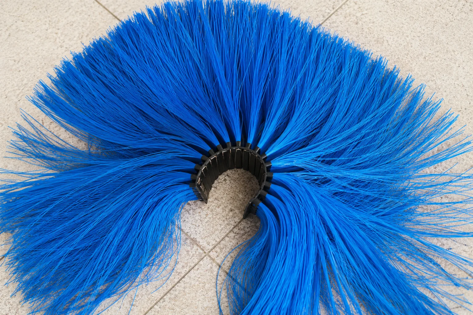 Long-filament segment for automatic car wash wrap-around brushes