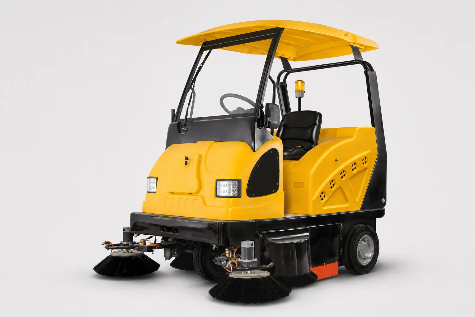 Yellow ride-on industrial floor sweeper with twin side brushes