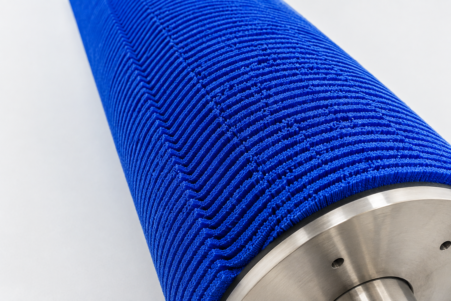 Close-up of an industrial roller brush for potato peeling equipment