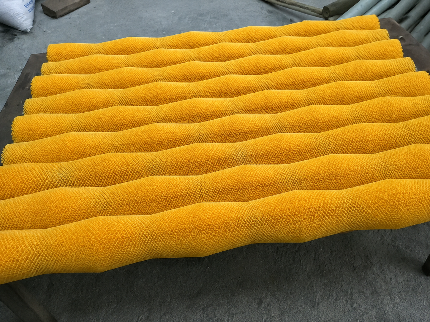 Yellow nylon cylinder brushes with a wavy brush face for fruit washing equipment