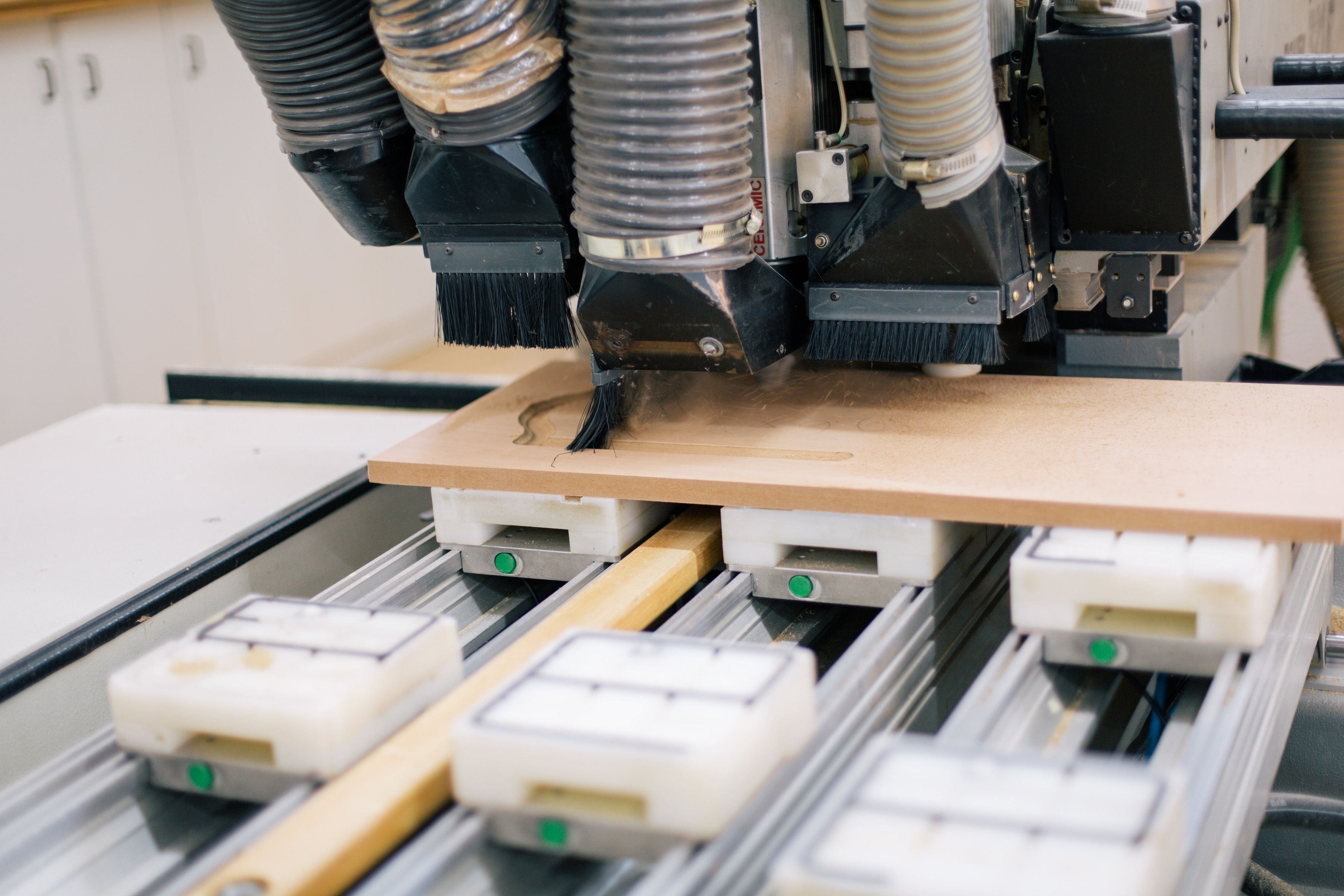 Custom strip brush installed on automated packaging equipment