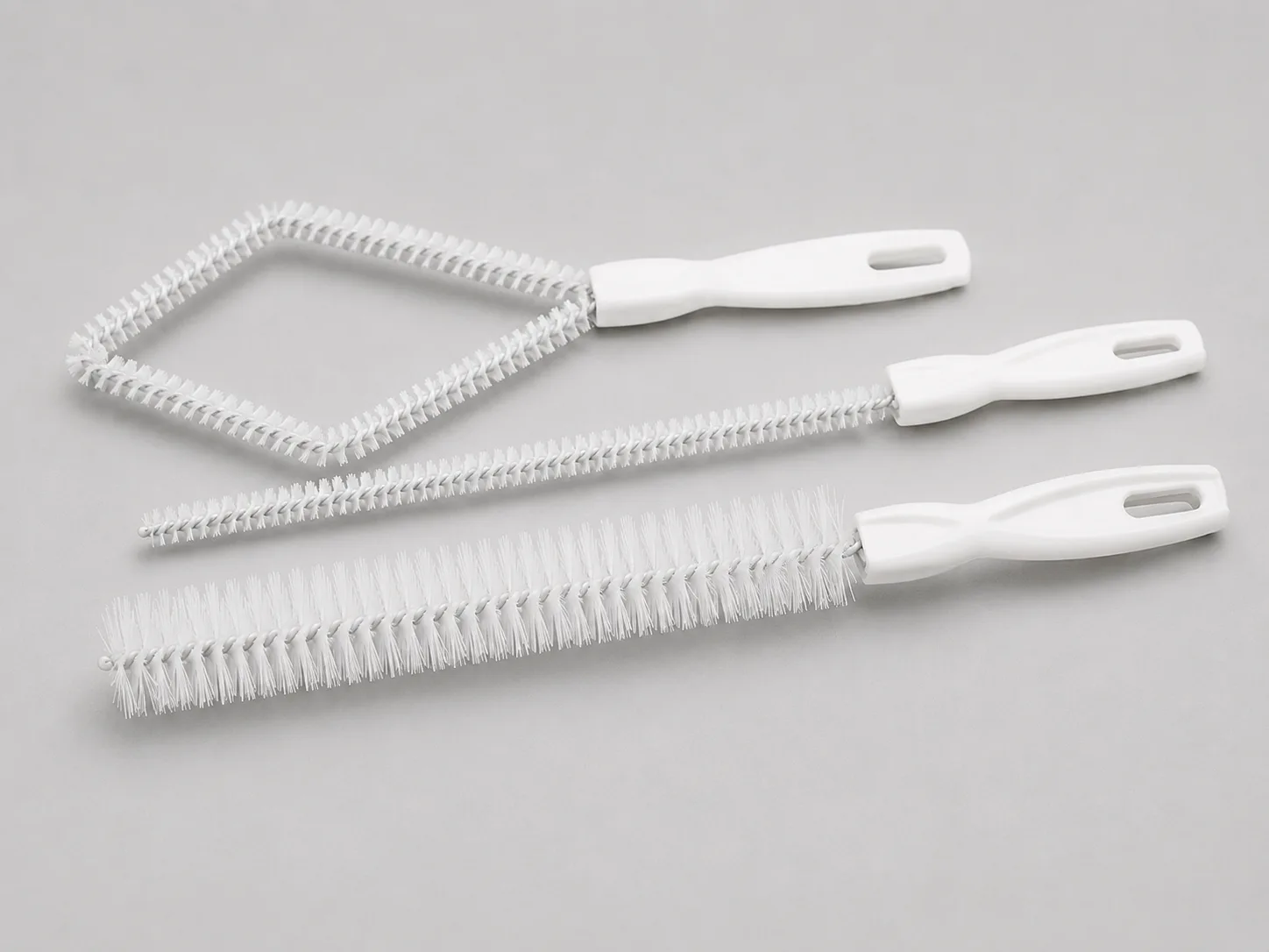 Nylon pipe brush for controlled cleaning and maintenance around pharmaceutical equipment
