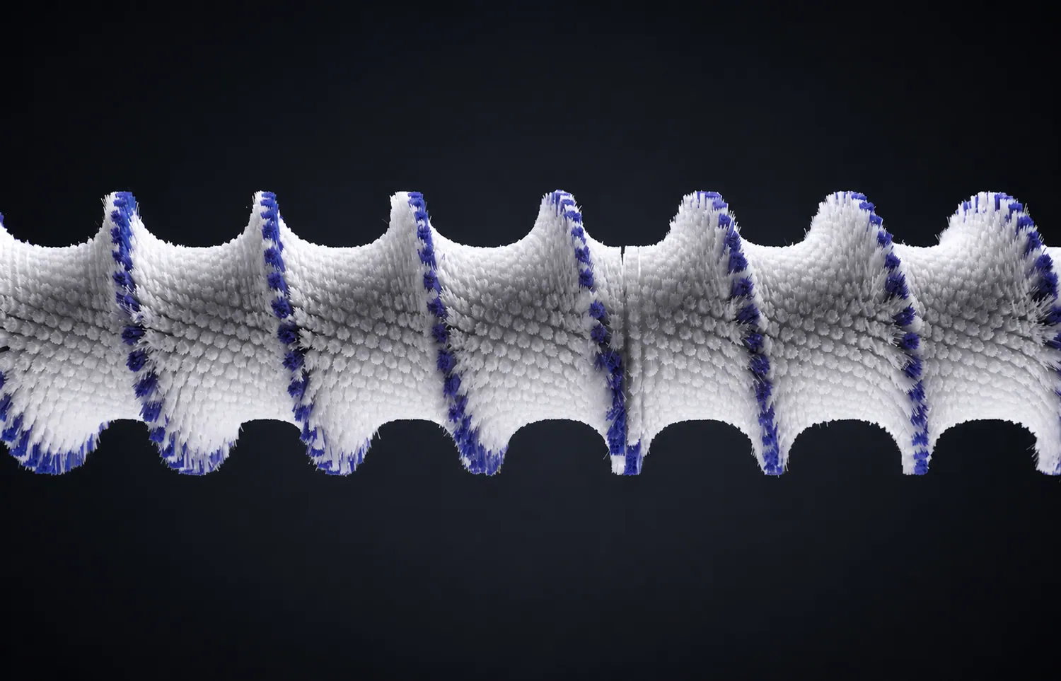 Custom spiral capsule polishing brush with blue and white filaments