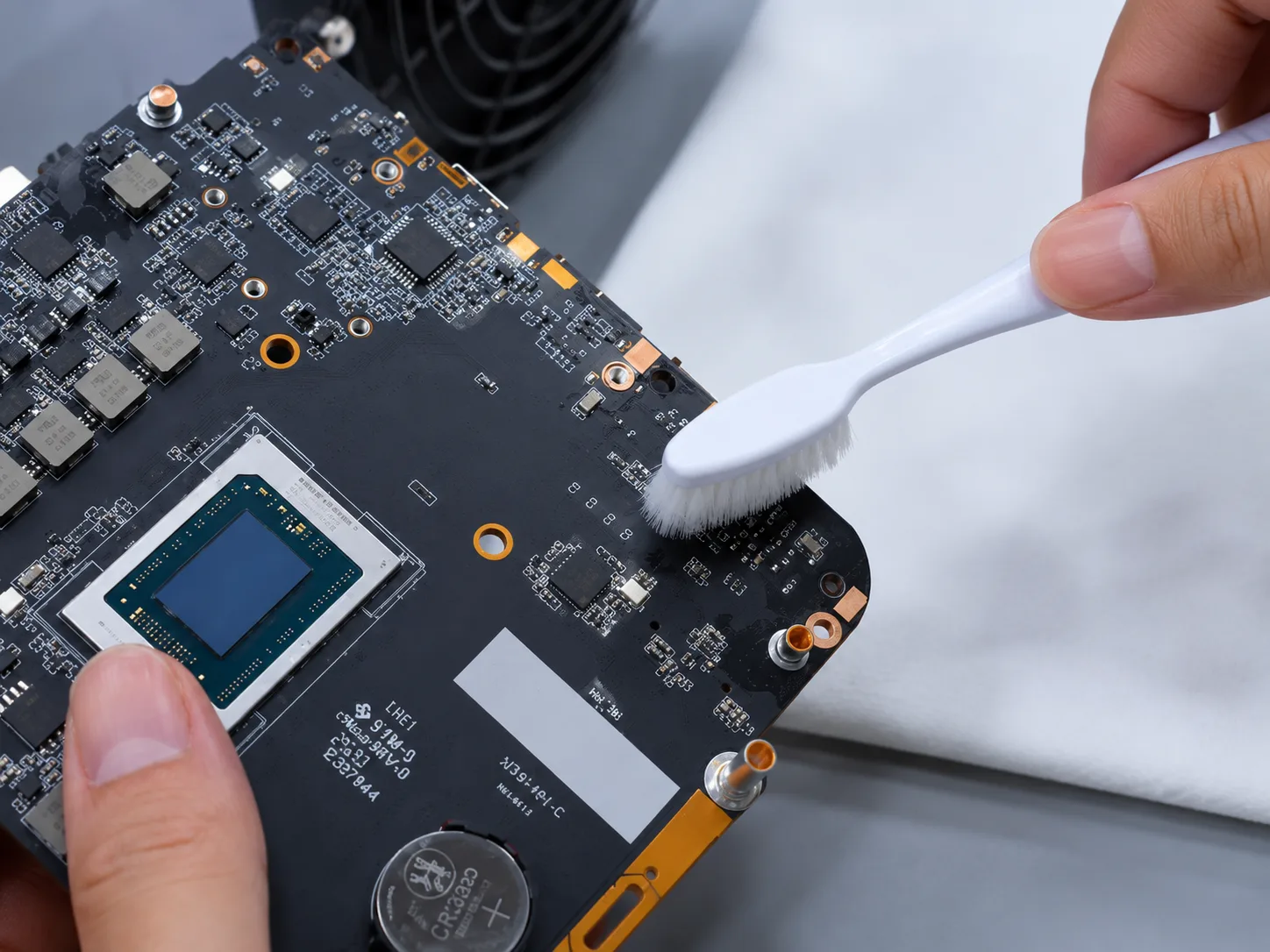 Anti-static brush cleaning a PCB for semiconductor equipment maintenance