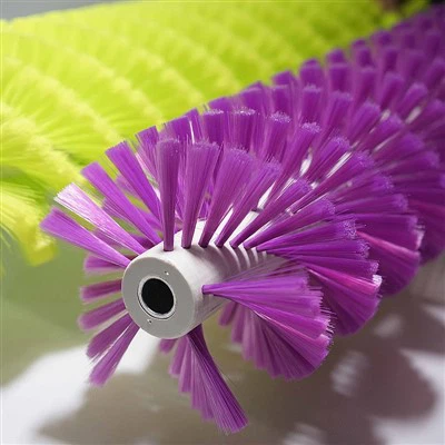 Solar panel cleaning brushes with spiral filament layout for continuous contact