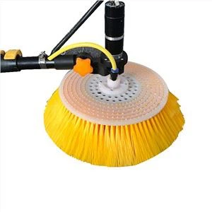 Yellow rotating disc brush head for localized solar panel cleaning contact