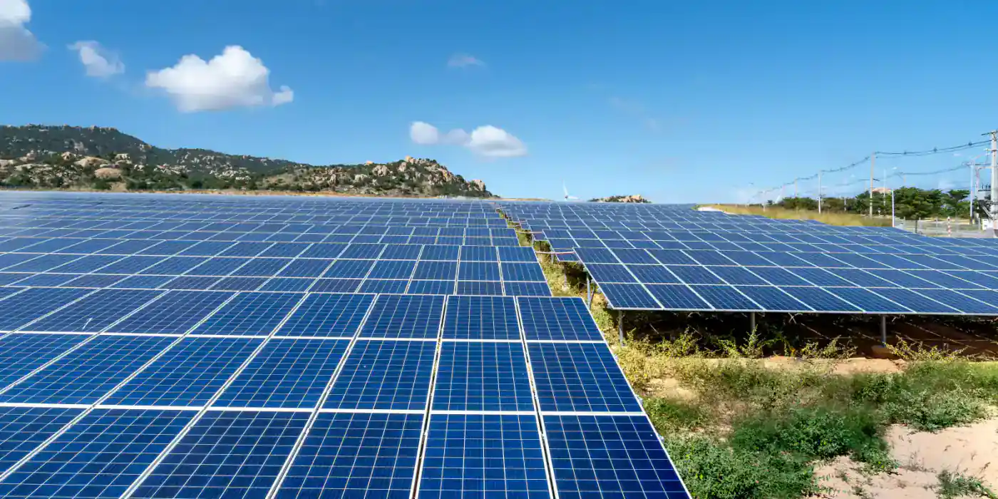 Solar panel cleaning brush working on photovoltaic panels