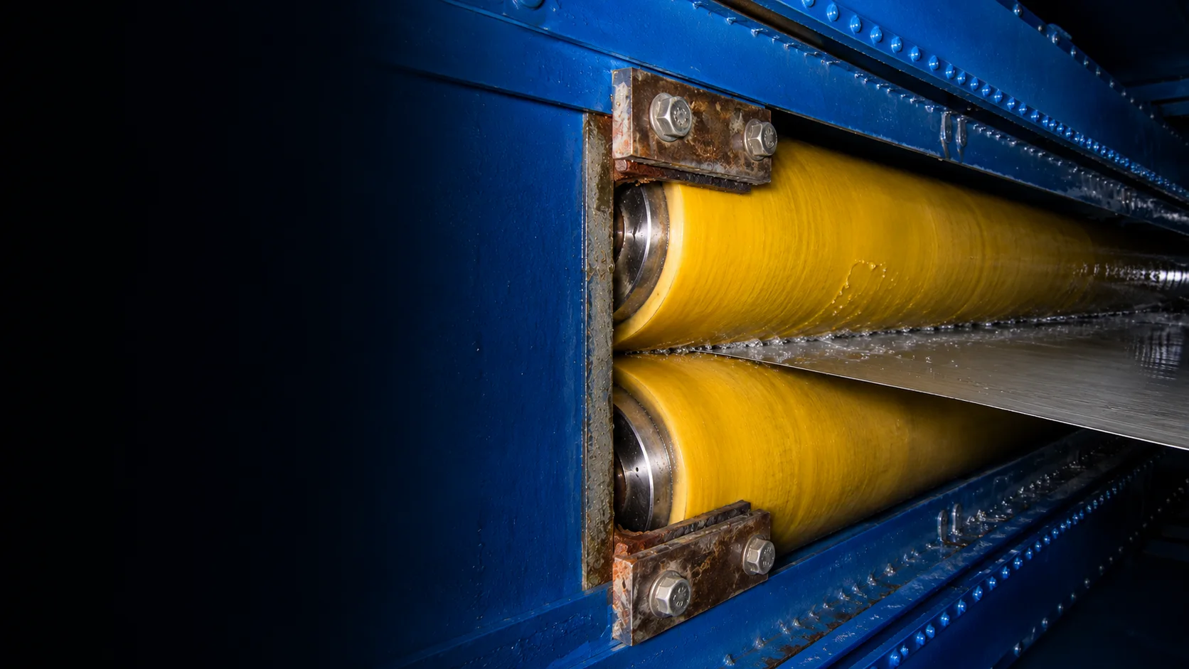 Custom nonwoven mill roll for steel strip processing lines