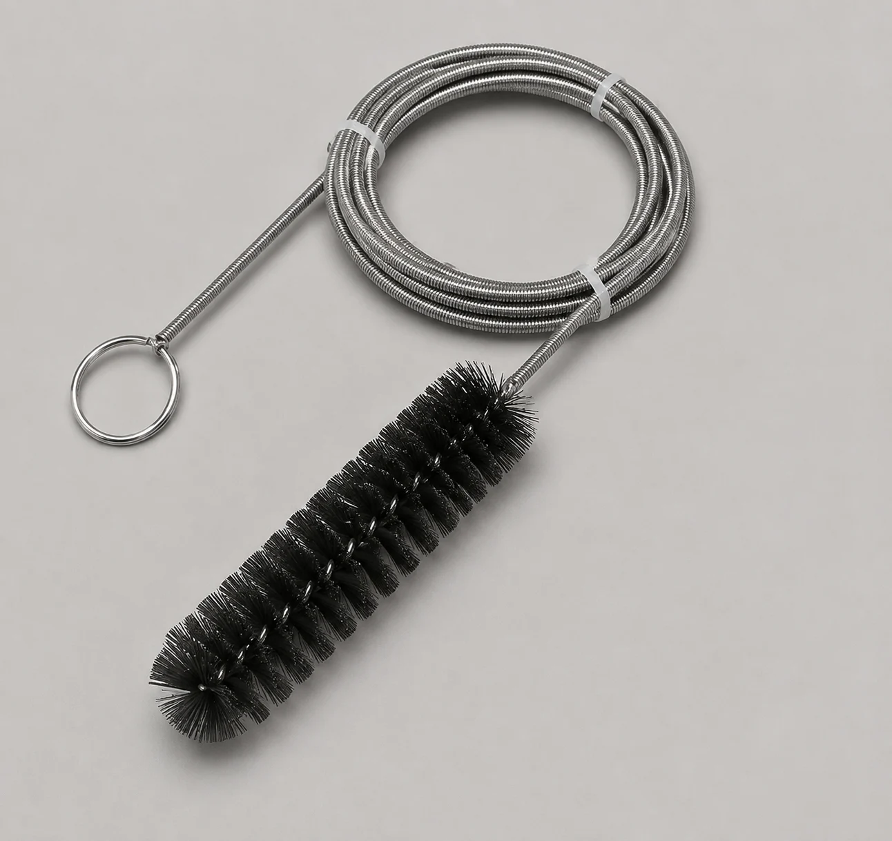 Flexible shaft pipe brush connection