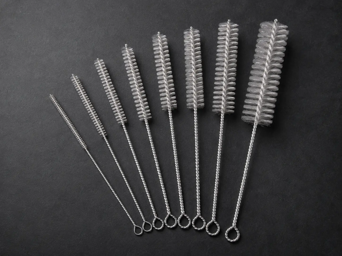 Abrasive nylon pipe and tube brushes for internal deburring
