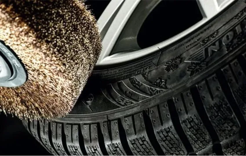 Industrial brushes used in automotive metal component cleaning and finishing