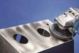 Nylon abrasive brush finishing a metal surface for controlled surface conditioning