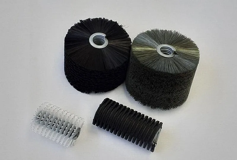 Close-up of industrial brush filament density and fill pattern on roller brushes