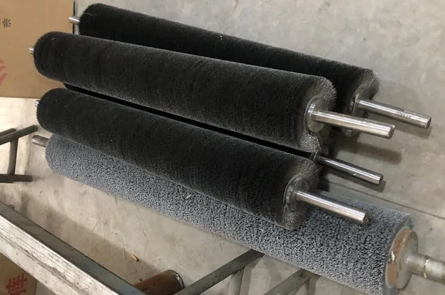 Large industrial roller brushes with steel shafts for conveyor and surface cleaning