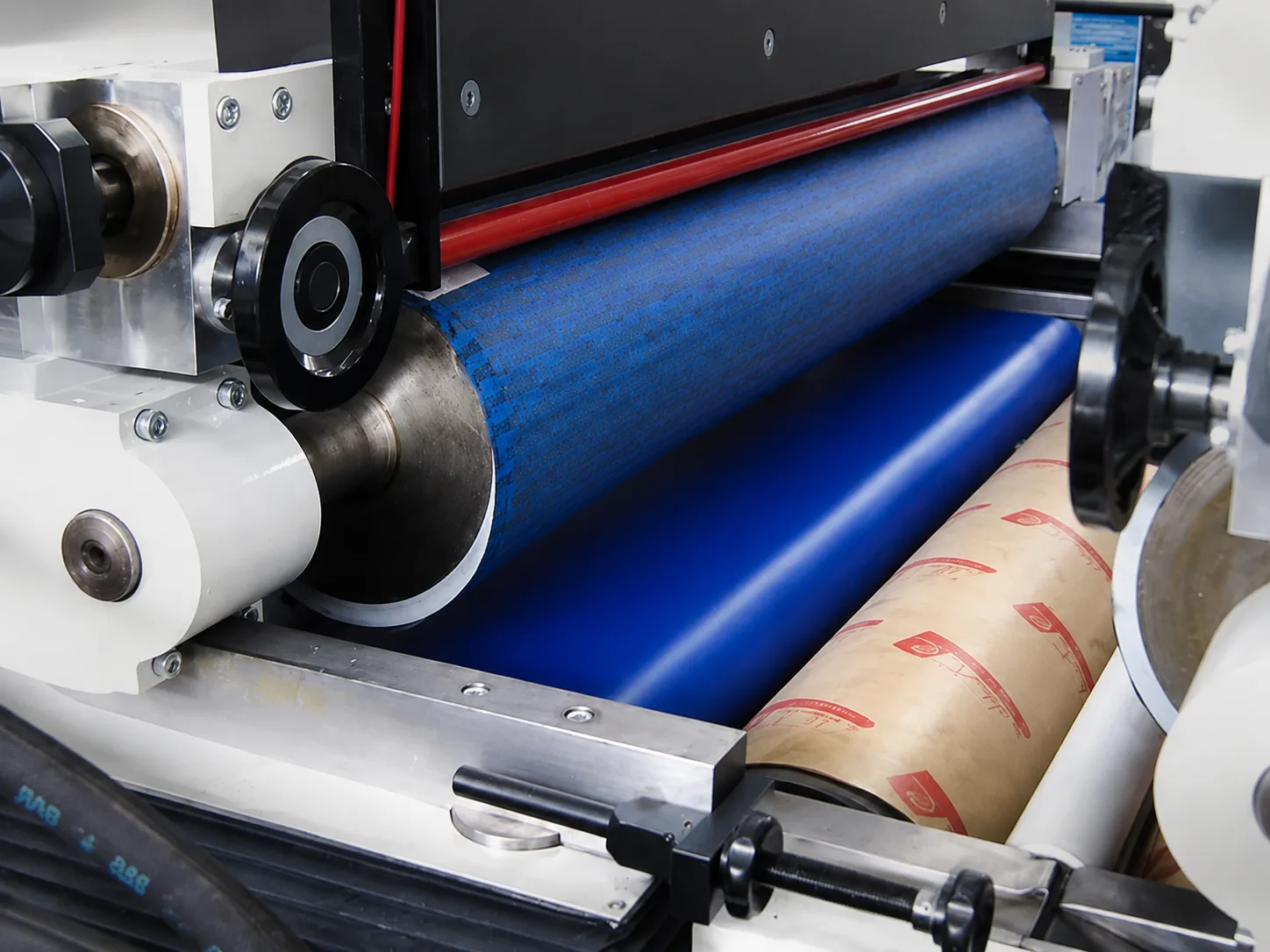 Rubber-covered roller for coating and adhesive application