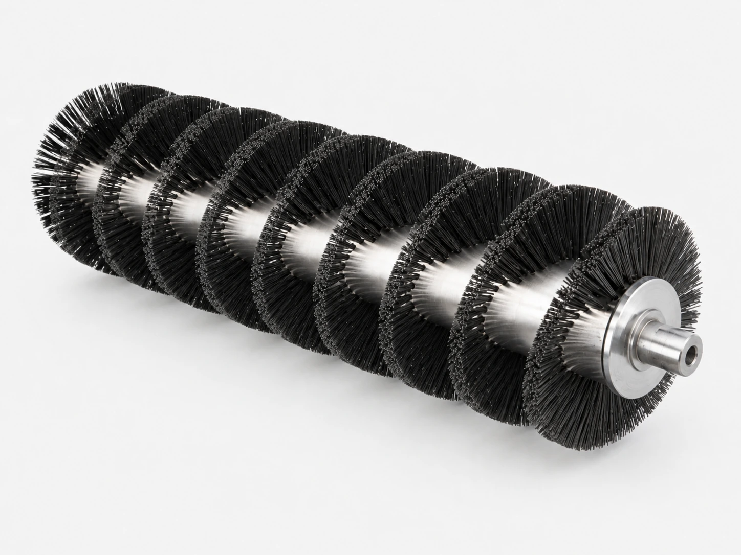 Spiral strip brush wound onto a shaft with visible mounting detail for OEM line equipment