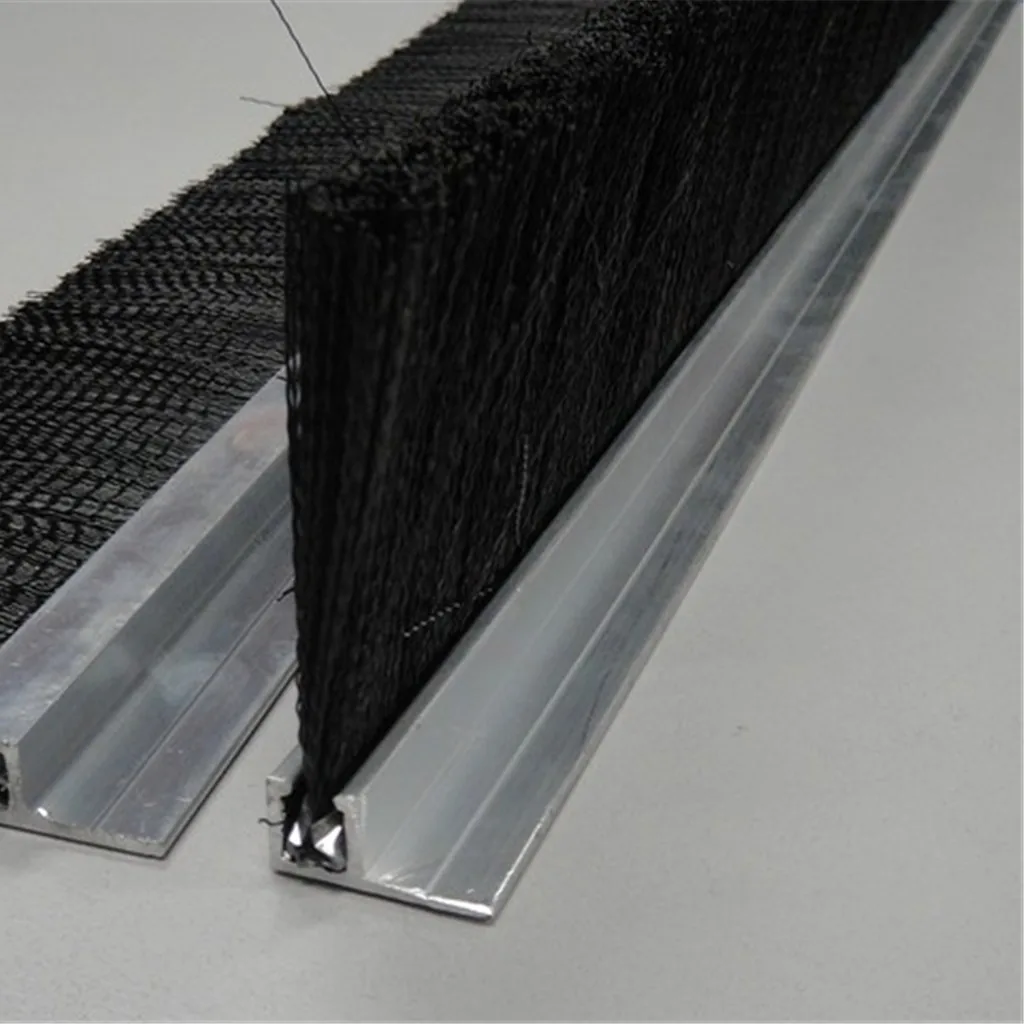 Metal U-channel backing used in strip brush construction