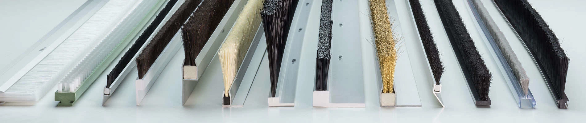 Custom metal channel strip brushes manufactured for industrial sealing and guiding