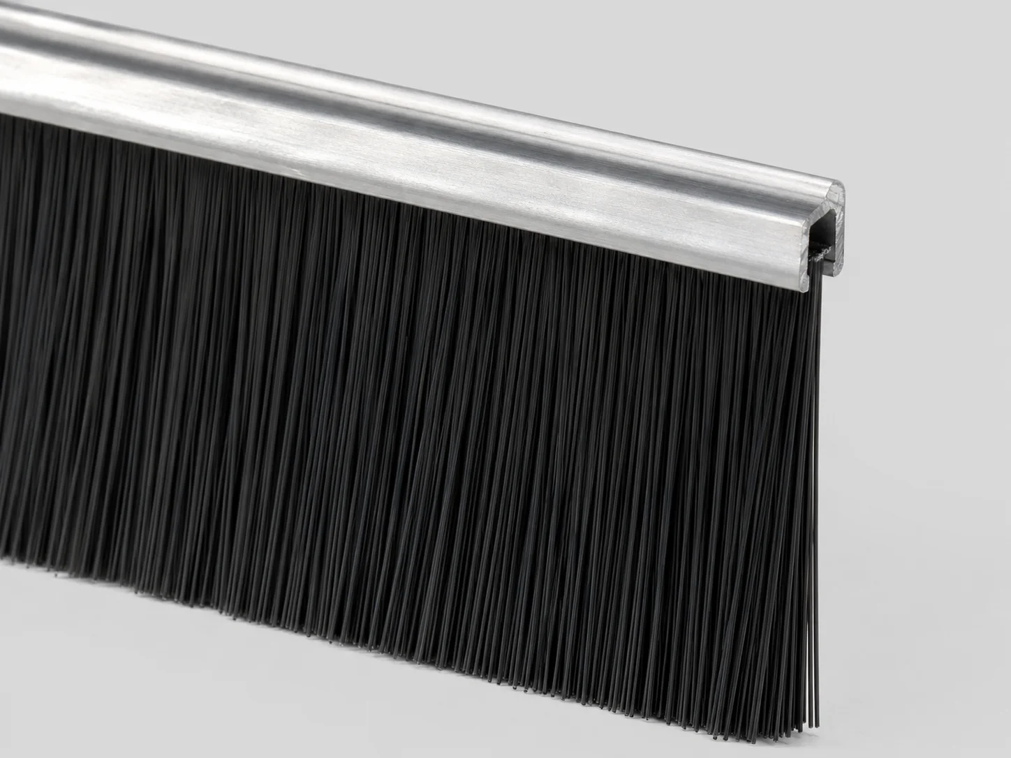 Nylon filament options for metal channel strip brushes