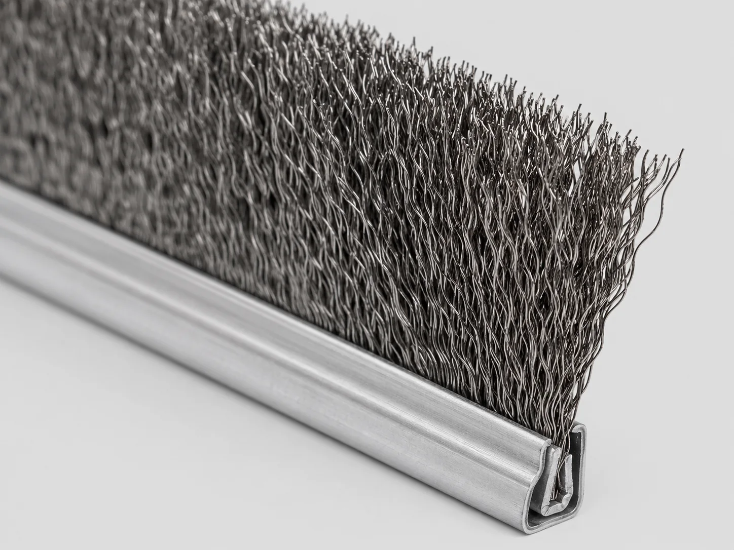 Steel wire filament for metal channel strip brushes