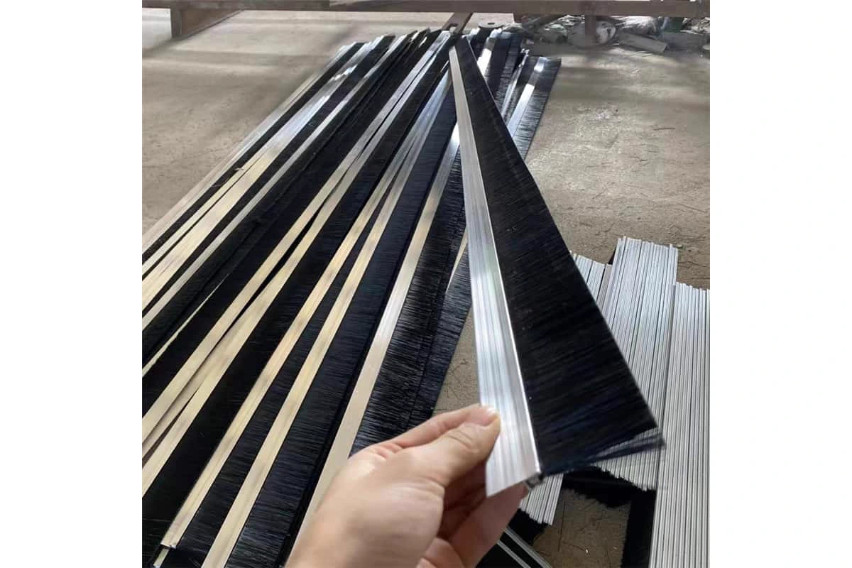 Batch of custom strip brushes with metal channel backing