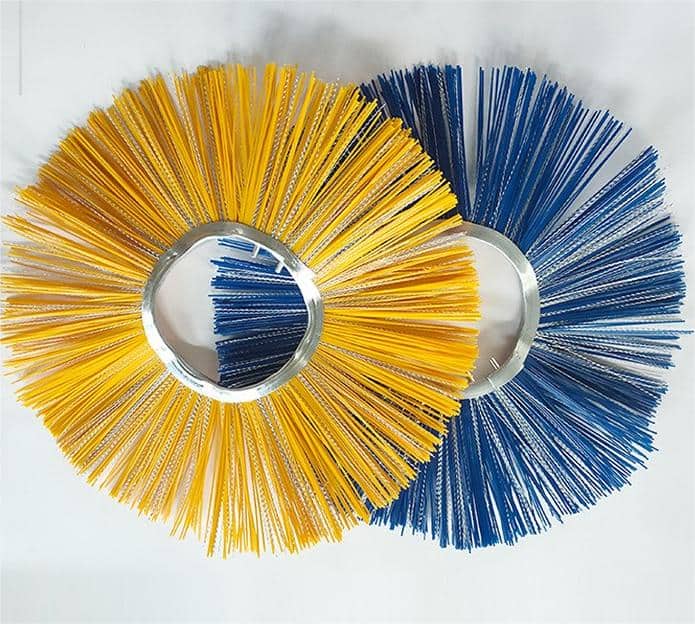 Yellow and blue disc wafer brush sections for road sweeper assemblies