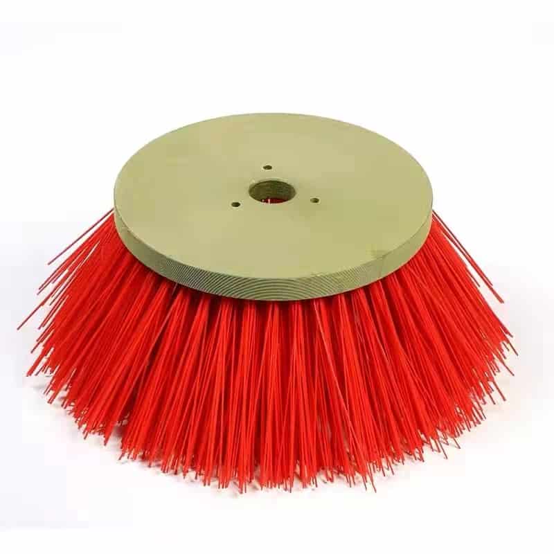Red rotating side sweeper brush with round mounting plate