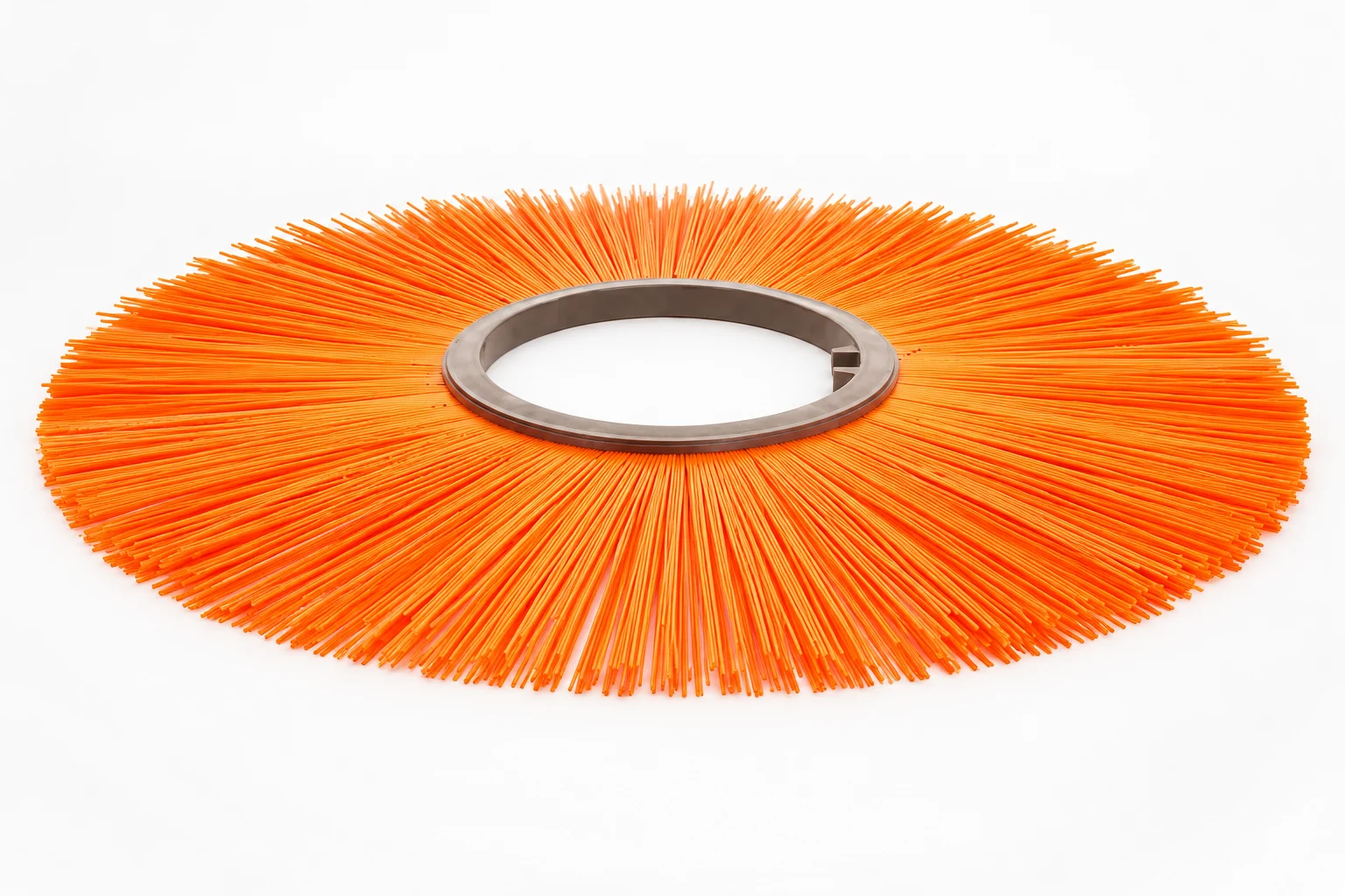 Orange polypropylene flat wafer brush for a sweeper broom
