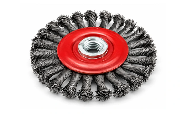 Knotted wire wheel brush with red hub on a white background